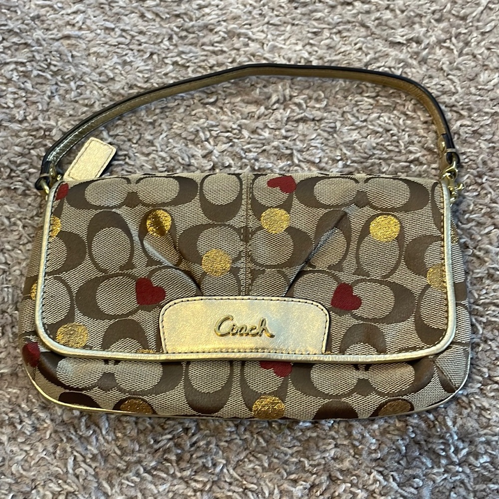 Vintage Coach clutch, heart print with gold lining and trim